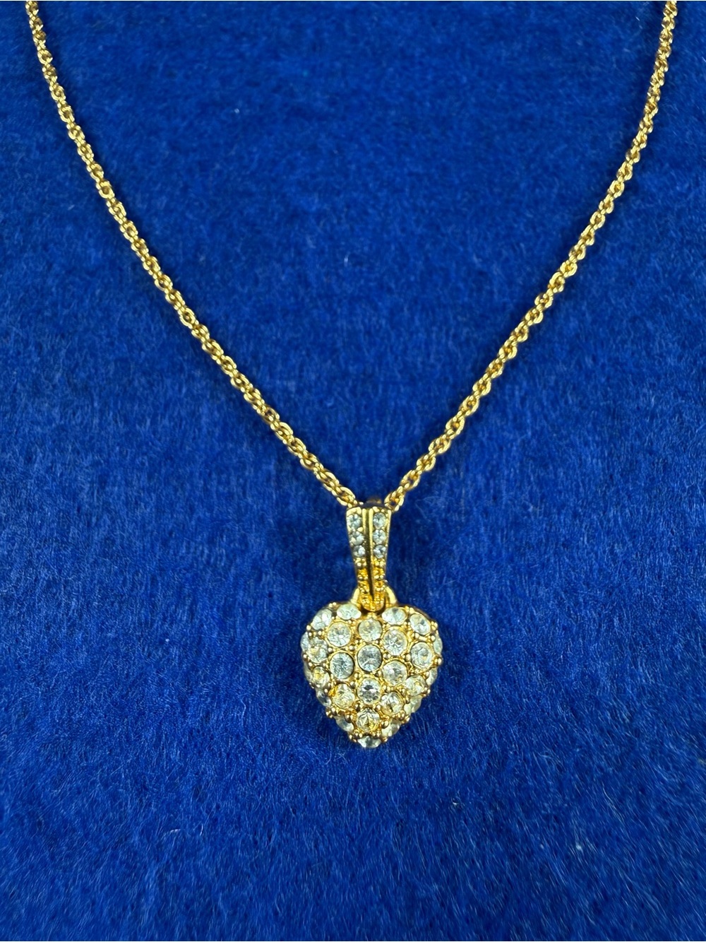 Vintage Monet Gold tone heart with Crystal accents pendant necklace.